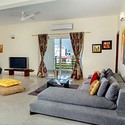 Common Room: Spacious common room with a soothing decor at Concord Casablanca Serviced Apartment