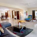 Common Living & Dining Room: A well lit common living and dining room with ample space at Concord Casablanca Serviced Apartment